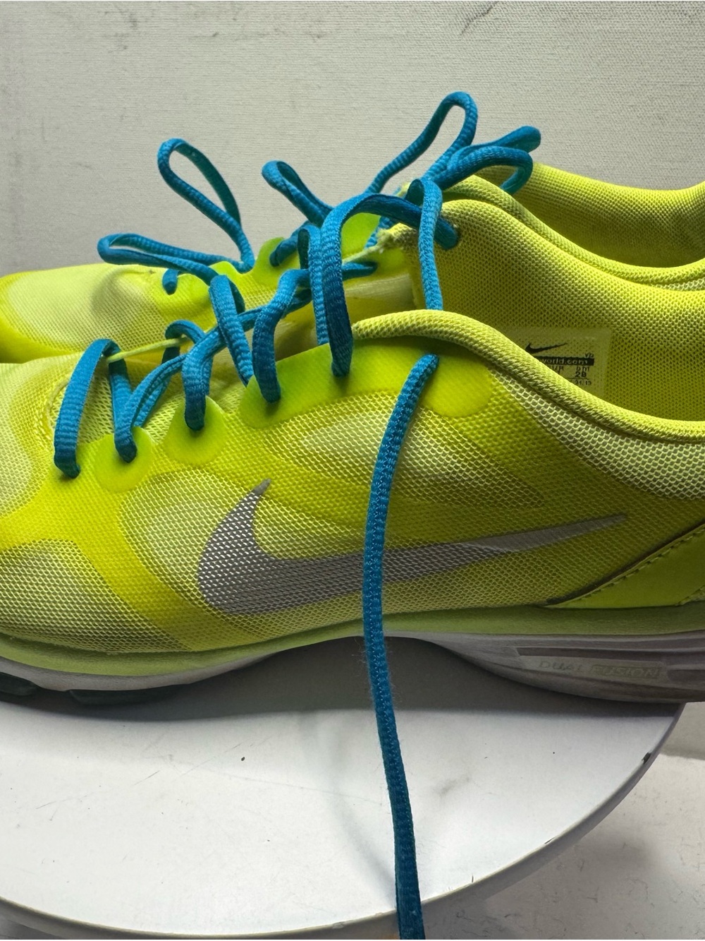 Nike Men’s Neon Yellow Athletic Shoes with Blue Laces